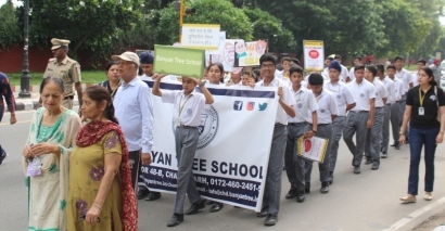 Administrator VP Singh Badnore departs the Walkathon rally from Governor House